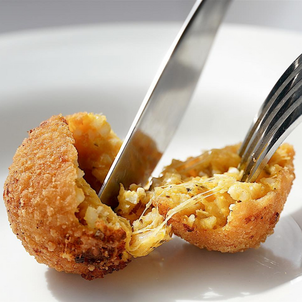 Close up of Pumpkin and feta arancini which is Gluten-free, Low FODMAP, vegetarian arancini.