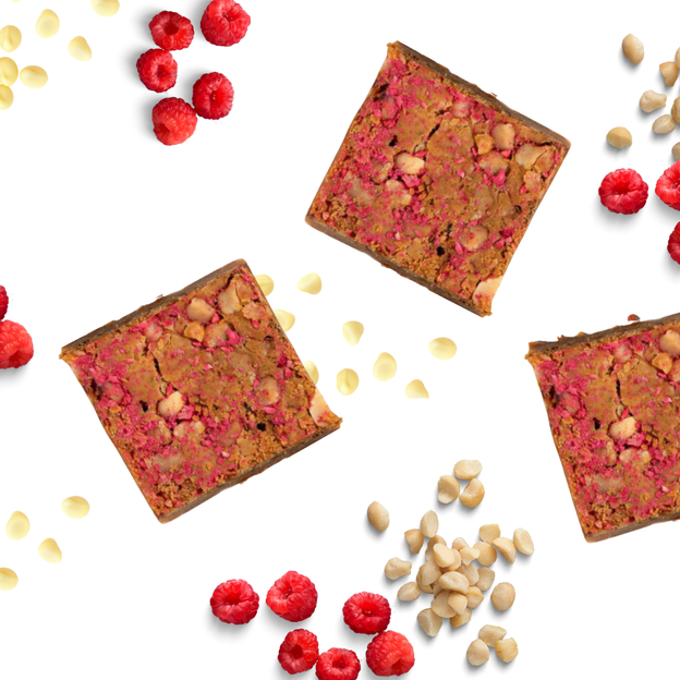 Gluten-free, Low FODMAP raspberry and macadamia square — sweet fruit and crunchy macadamias for a tasty, digestion-friendly snack.
