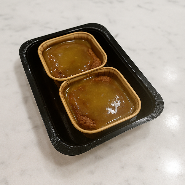 Gluten-free, low FODMAP sticky date puddings by We Feed You. Two per serves per pack.