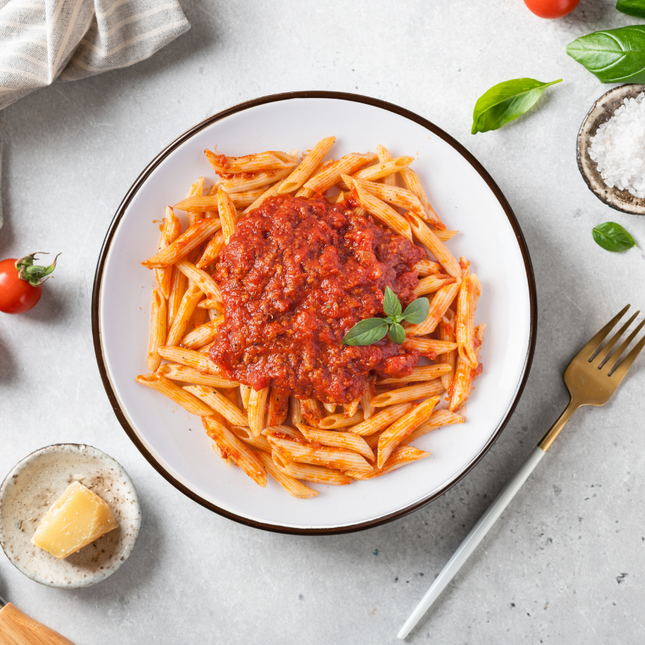 Penne bolognese (350g) with free range beef in a rich tomato and herb sauce, gluten free and lactose free.