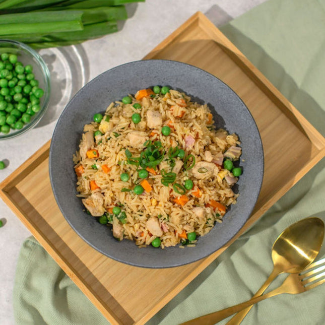 Chicken Fried Rice LOW FODMAP certified, We Feed You, lactose free & gluten free ready meal in bowl. 