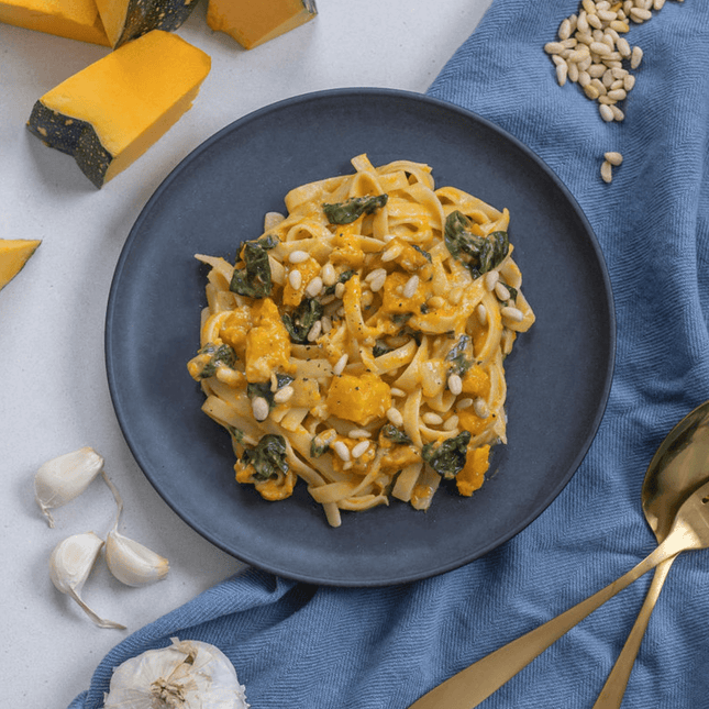Vegetarian pumpkin fettuccine (350g) with roasted pumpkin, spinach and pine nuts in a creamy sauce, gluten free.