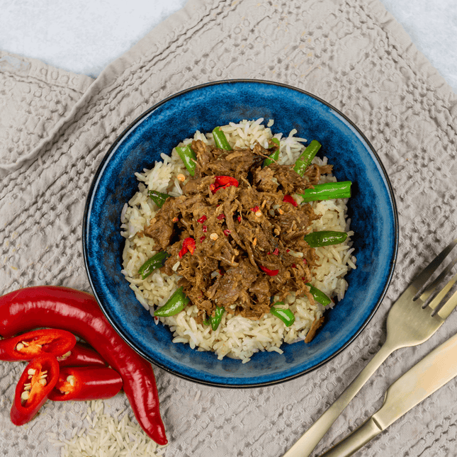 Beef Rendang Curry ready meal in bowl by We Feed You. This meal is Gluten Free & Lactose Free